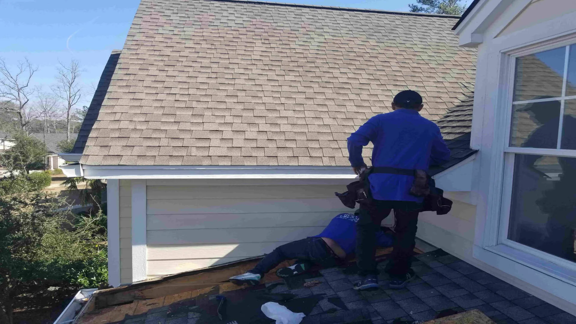 BreakPoint Roofing - Florence roof repair crew fixing a leak